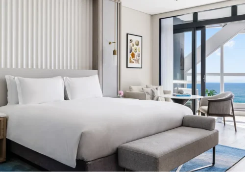 tlgdc_deluxe_skyline_ocean_king_bedroom_2022_lores_rgb-1_XLarge